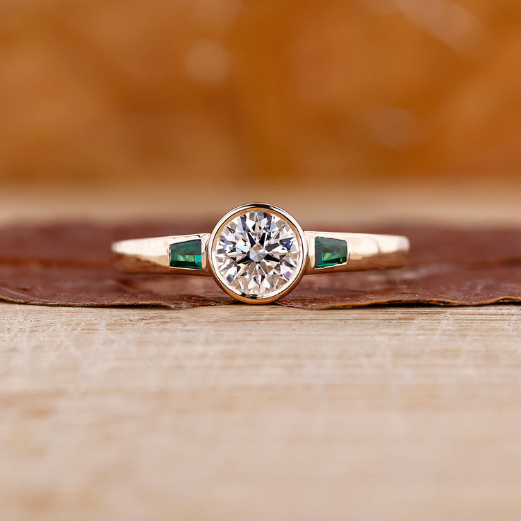 Bezel set engagement ring with round diamond engagement ring.
