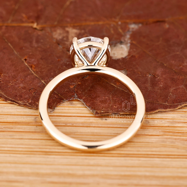 Round old cut diamond ring handmade four prong set.