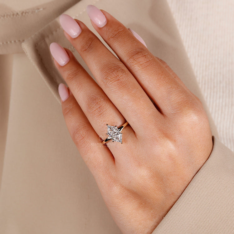 Handmade jewellery ring featuring Dutch marquise solitaire diamond.
