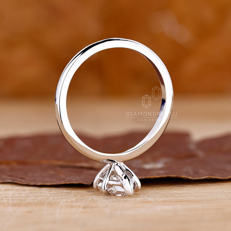 Lab Grown Diamond added to v prong setting.
