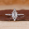 Elongated Hexagon Step Cut ring with solitaire engagement ring.
