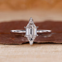 Elongated Hexagon Step Cut ring with solitaire engagement ring.
