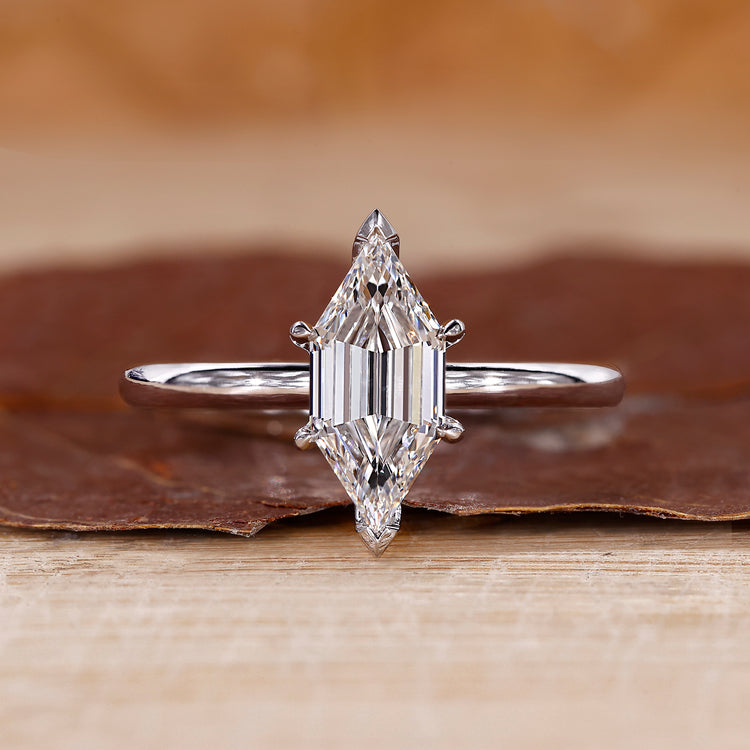 Elongated Hexagon Step Cut ring with solitaire engagement ring.
