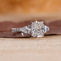 White gold engagement ring has pave setting ring.
