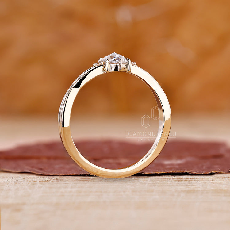 Lab Grown Diamond in oval rose cut engagement ring.
