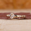 Oval rose cut engagement ring with 3 stone diamond ring.
