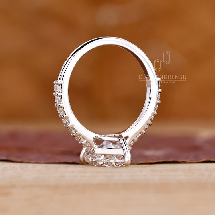 Custom white gold ring with pear diamond and prong setting.
