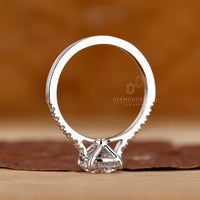 Round diamond engagement ring and cathedral setting ring.
