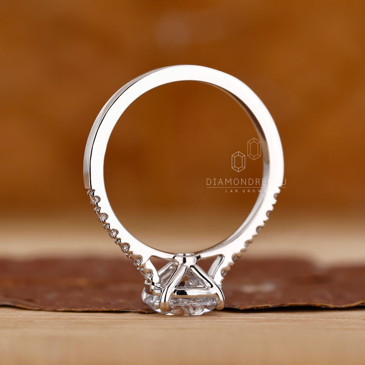 Round diamond engagement ring and cathedral setting ring.
