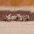 Nature Inspired Wedding Band with marquise and round diamonds.
