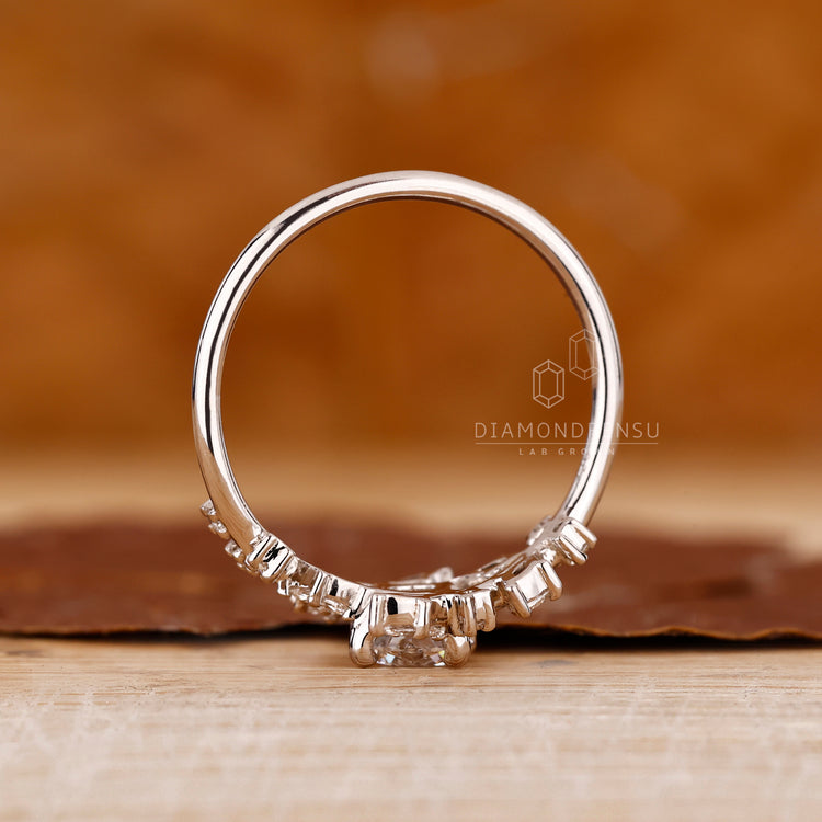 Handmade round and marquise diamond ring.

