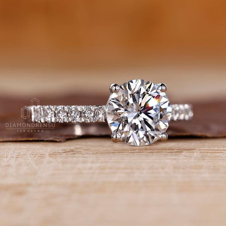 Lab Grown Diamond in round diamond engagement ring.
