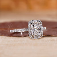 Buy engagement ring with elongated cushion cut diamond ring.
