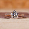 Rose gold diamond ring with round cut diamond ring.
