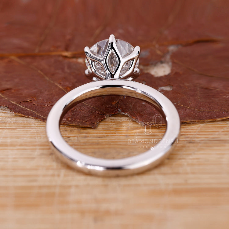 Buy Engagement ring with tulip setting ring.
