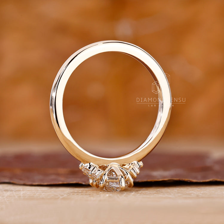 Solitaire engagement ring with marquise diamond in 8 claw prong.
