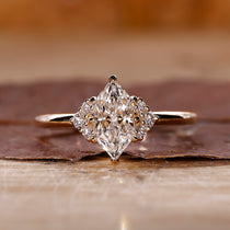 Dutch marquise solitaire diamond ring with 8 claw prong setting.
