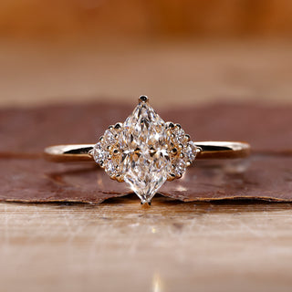 Dutch marquise solitaire diamond ring with 8 claw prong setting.
