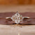 Dutch marquise solitaire diamond ring with 8 claw prong setting.
