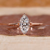 Rose gold engagement ring with marquise cut ring.
