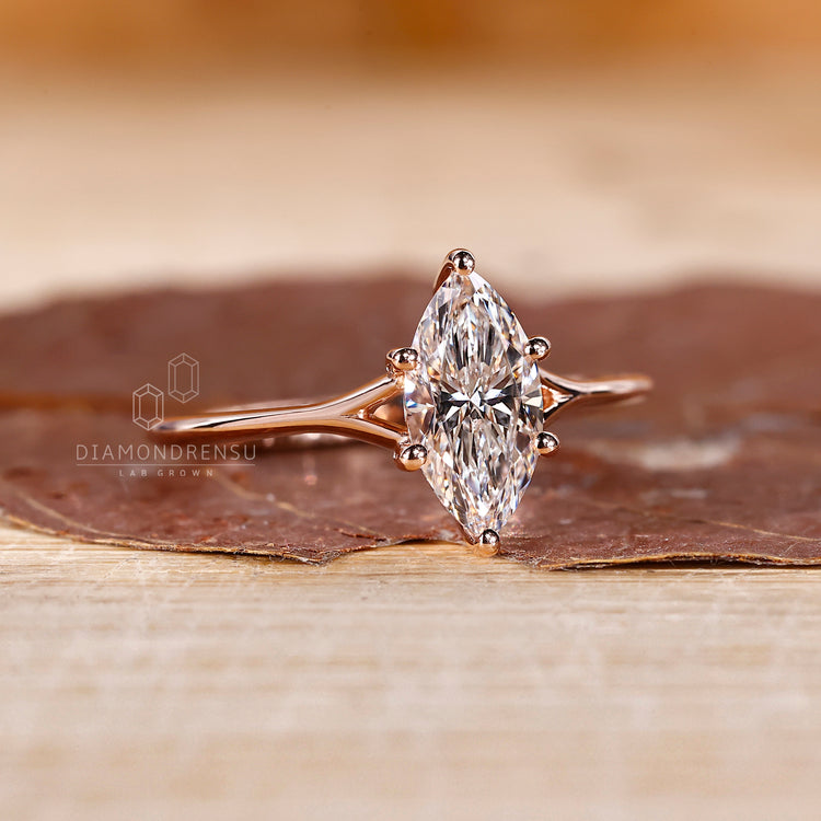 Rose gold engagement ring with 6 prong setting.
