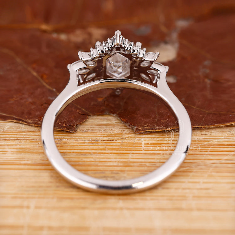 Handmade jewelry features tapered shank ring.
