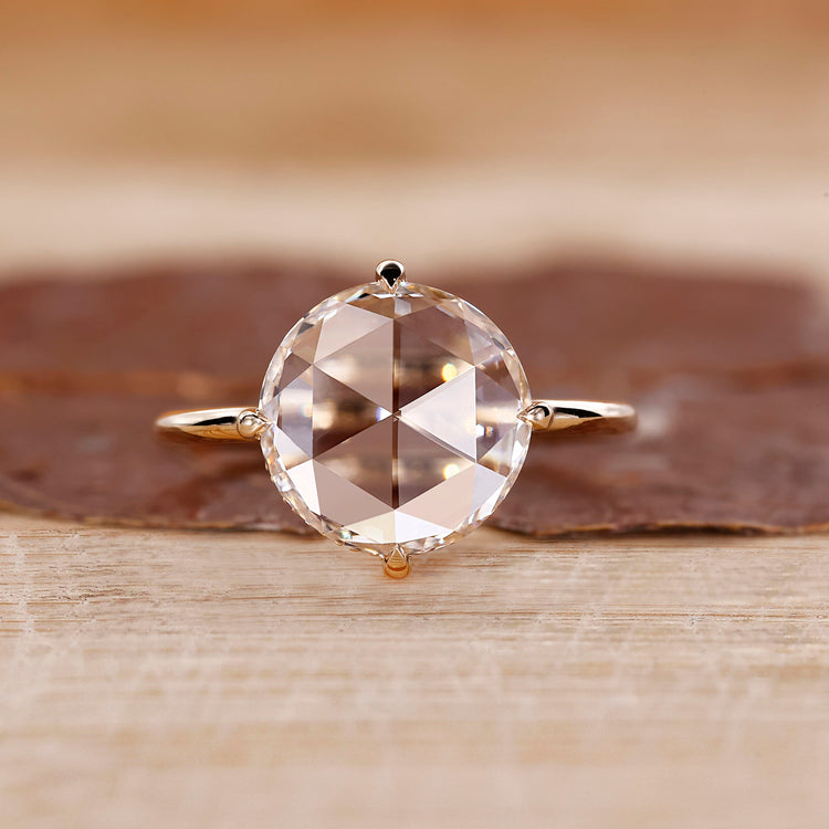 Round Rose Cut Diamond Ring with compass prong setting.
