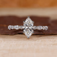 Marquise cut engagement ring in white gold.

