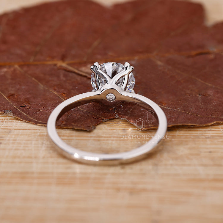 Lab grown diamond solitaire ring in a white gold setting.
