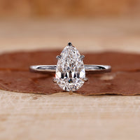 Pear solitaire engagement ring crafted in a 6 claw prong setting.
