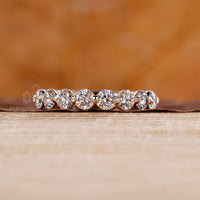 Half eternity diamond wedding band for her.
