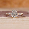 Cushion cut diamond ring with hidden halo ring.
