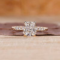 Cushion cut diamond ring with hidden halo ring.
