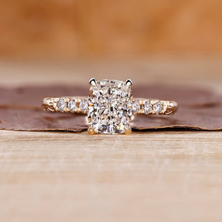 Cushion cut diamond ring with hidden halo ring.
