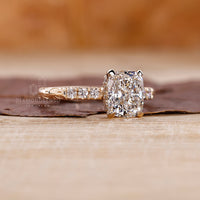 Yellow gold ring with cushion cut diamond ring.
