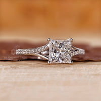Pave princess diamond ring split shank cathedral set.
