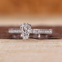 Coffin Cut Ring with a Cathedral Prong Setting that's sure to Delight.