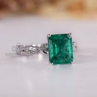 Four prong emerald cut gemstone ring setting.
