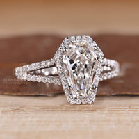 Halo coffin diamond ring split shank design.