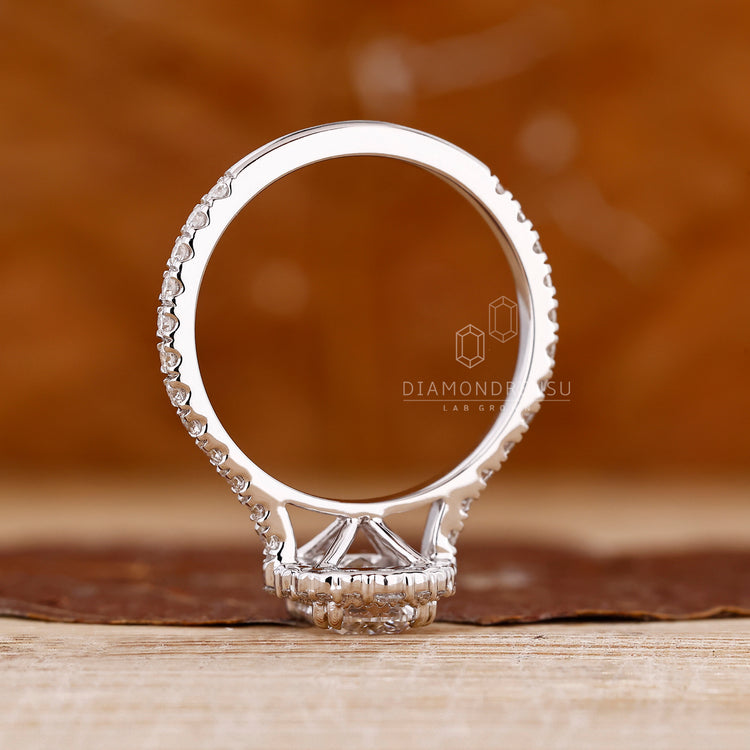 IGI certified handmade elongated cushion cut diamond ring.
