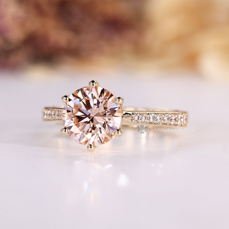 Round diamond ring with six prong setting.