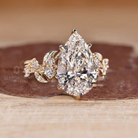 Pear Cut Diamond Engagement Ring round side stones.
