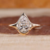 Pear cut diamond ring bezel prong solitaire style.
