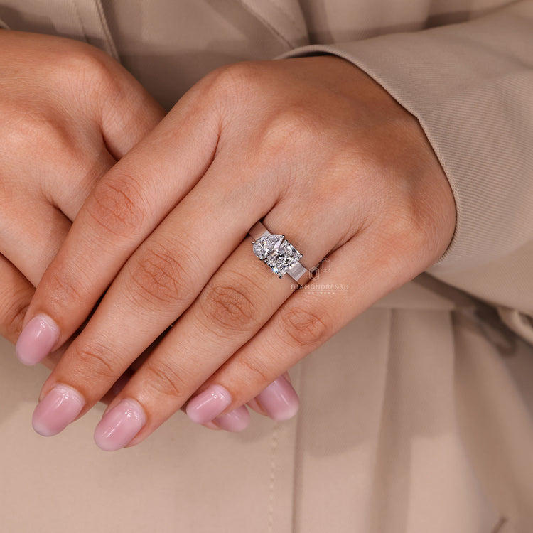 Radiant and pear cut two stone diamond ring.
