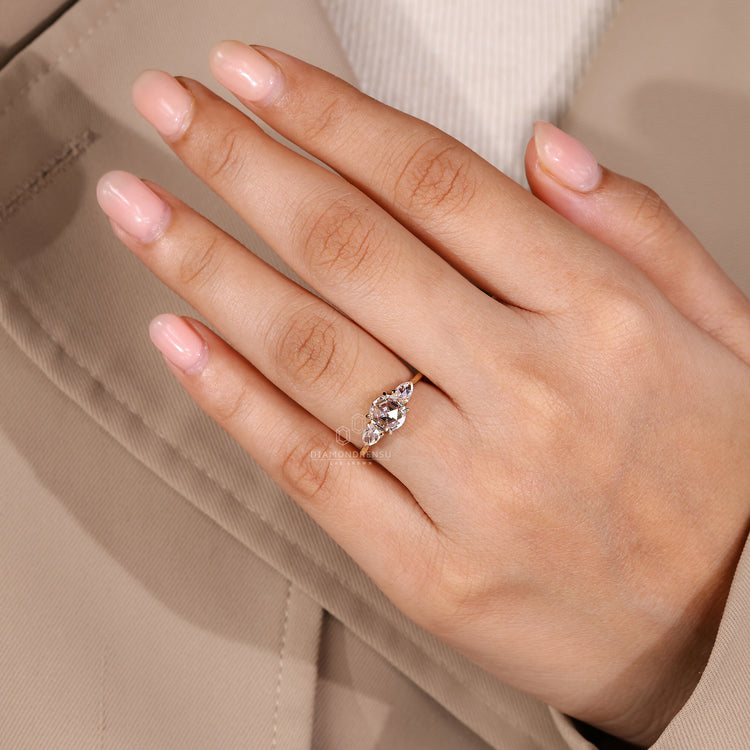 1-2 CT round rose cut diamond three stone ring.
