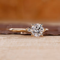 IGI certified round diamond ring with four prong setting.