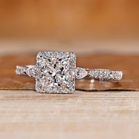 Lab grown princess diamond ring halo style.