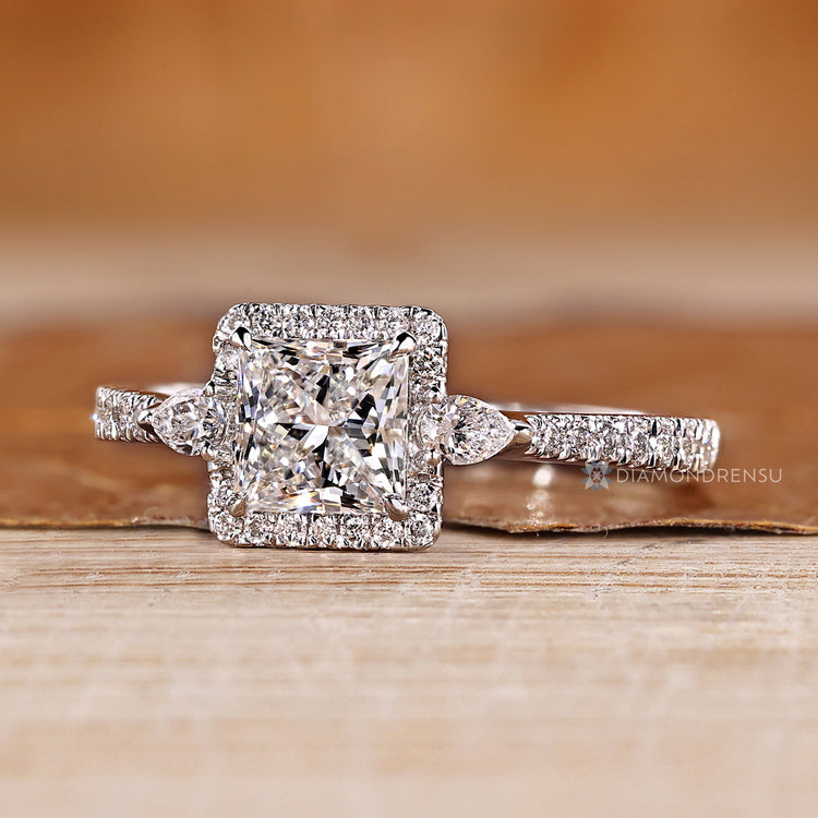 Lab grown princess diamond ring halo style.
