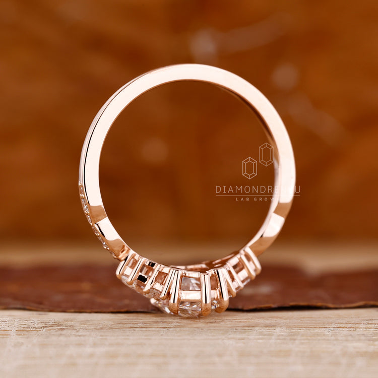 IGI certified pear diamond ring five claw prong set.