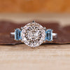 Portuguese cut diamond ring with emerald and sapphire.
